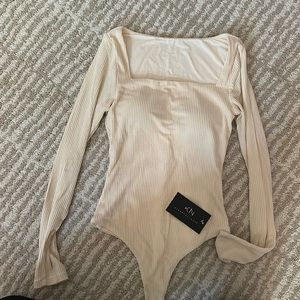 NWT Klassy Network Cream Ribbed Bodysuit
